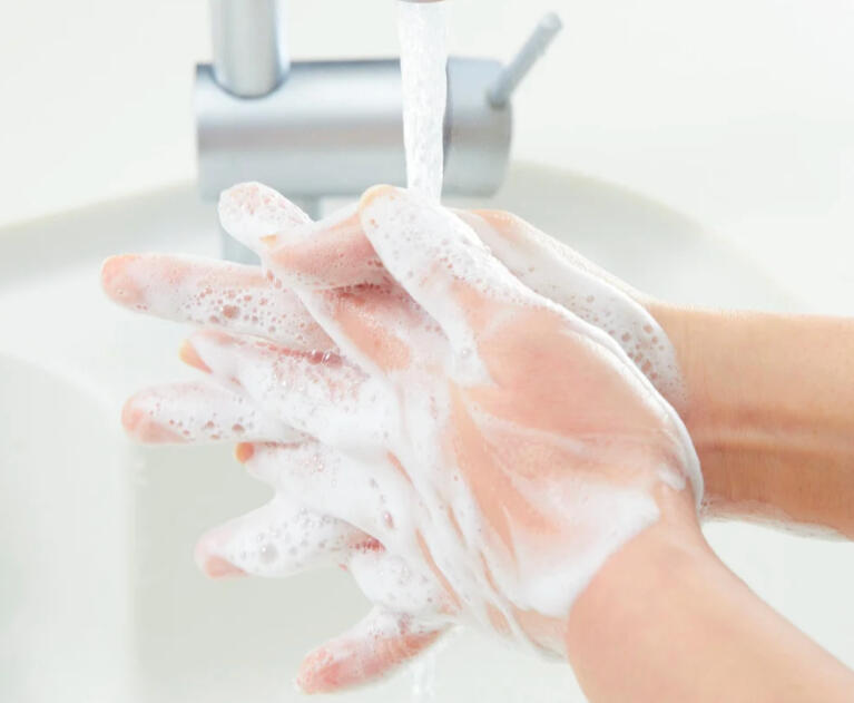 Washing hands in a sink